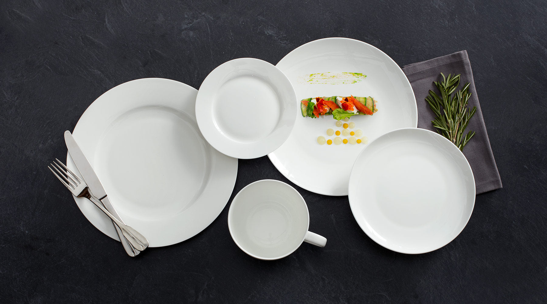 Lucerne White brings sophistication to any table using minimalist style, clean lines, and smooth, pure white surfaces.